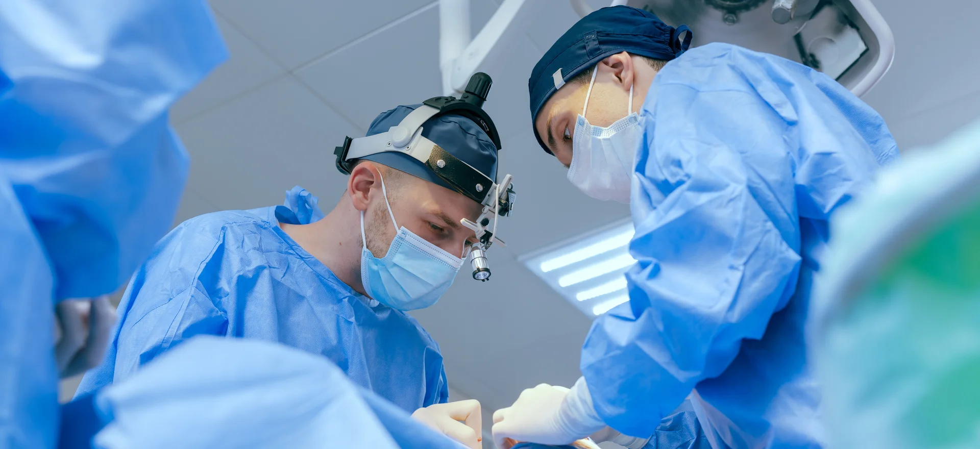 Two surgeons at work in an operating room